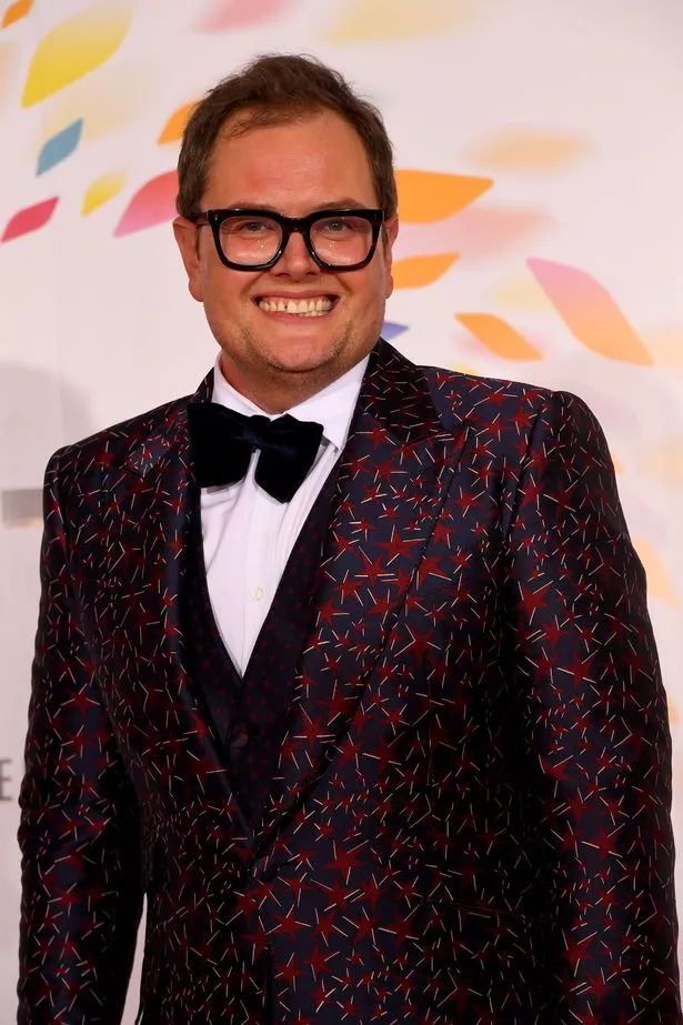 <a href="/hot-men/alan-carr/is-he-married-still-alive-related-jimmy-chatty">Alan Carr</a> Average body,  dark brown hair & hairstyles