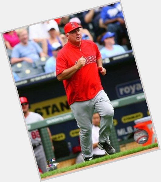 <a href="/hot-men/mike-scioscia/is-he-ill-going-be-fired-hot-seat">Mike Scioscia</a> Average body,  salt and pepper hair & hairstyles