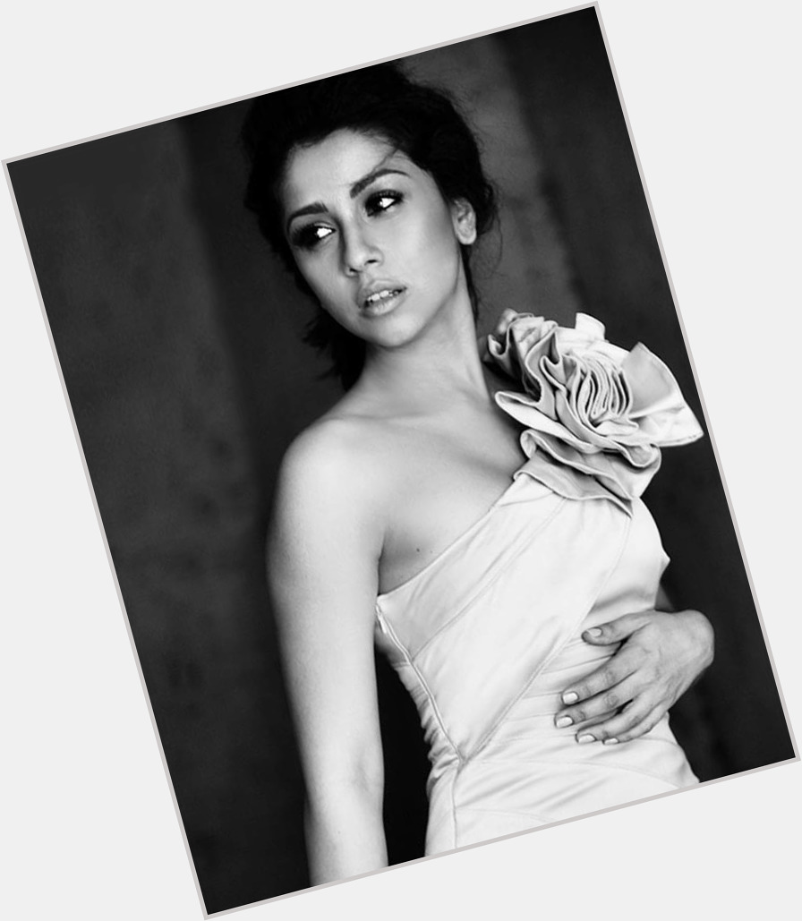 Amrita Puri Slim body,  dark brown hair & hairstyles