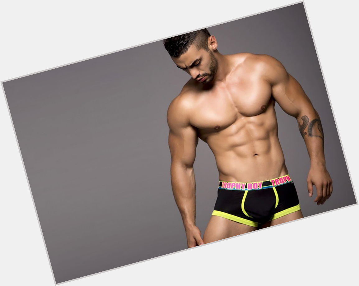 Andrew Christian Athletic body,  black hair & hairstyles