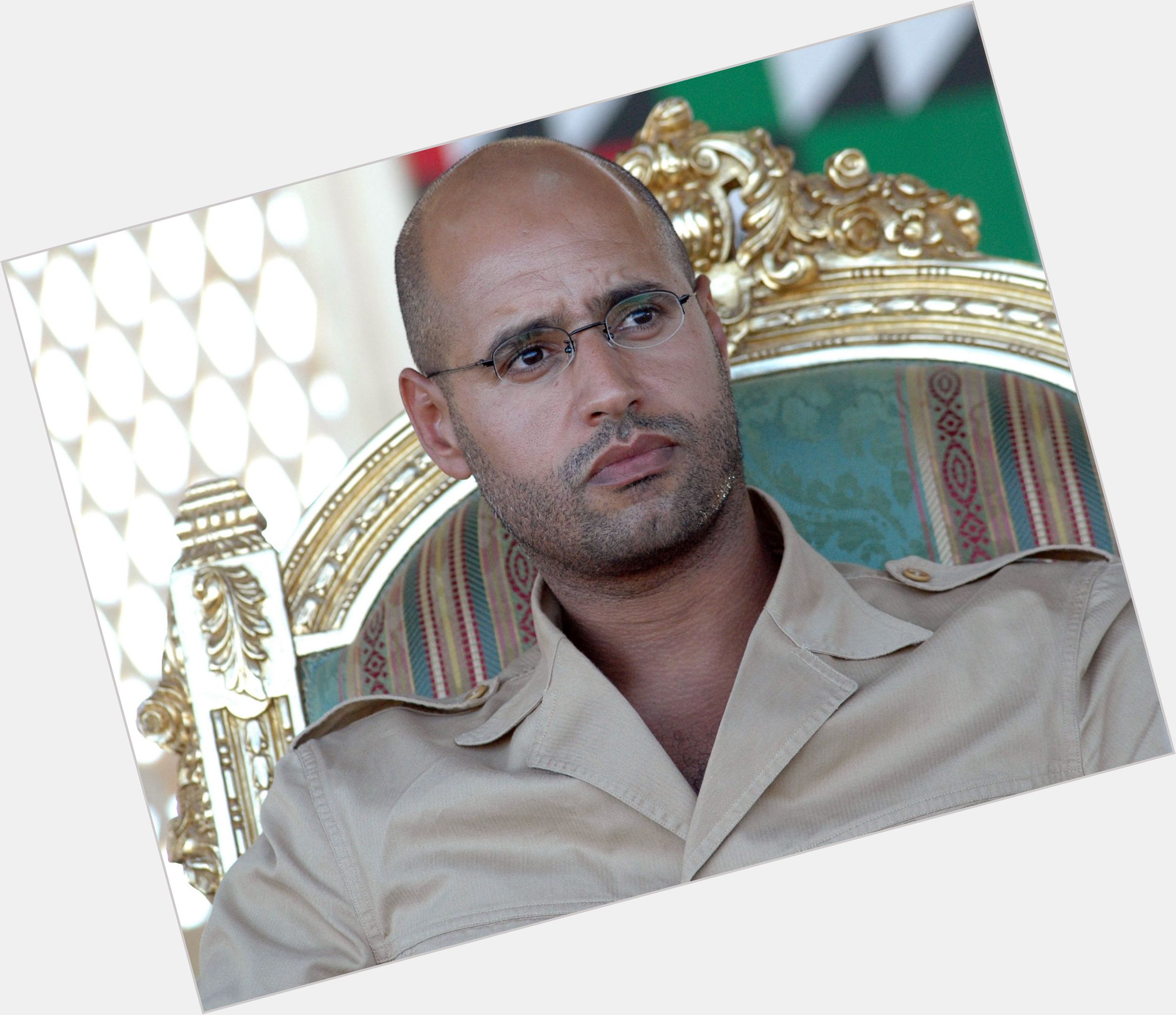 Saif Al Islam Gaddafi Average body,  bald hair & hairstyles