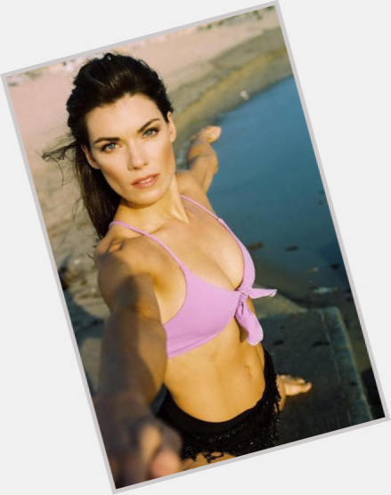 Amy Motta Slim body,  dark brown hair & hairstyles