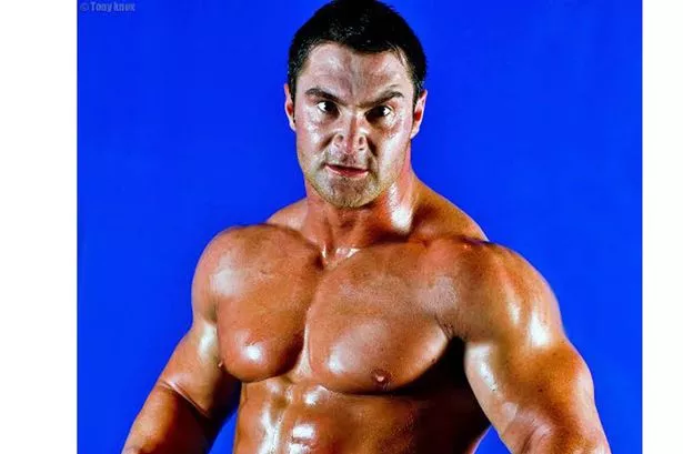 Barri Griffiths Bodybuilder body,  dark brown hair & hairstyles