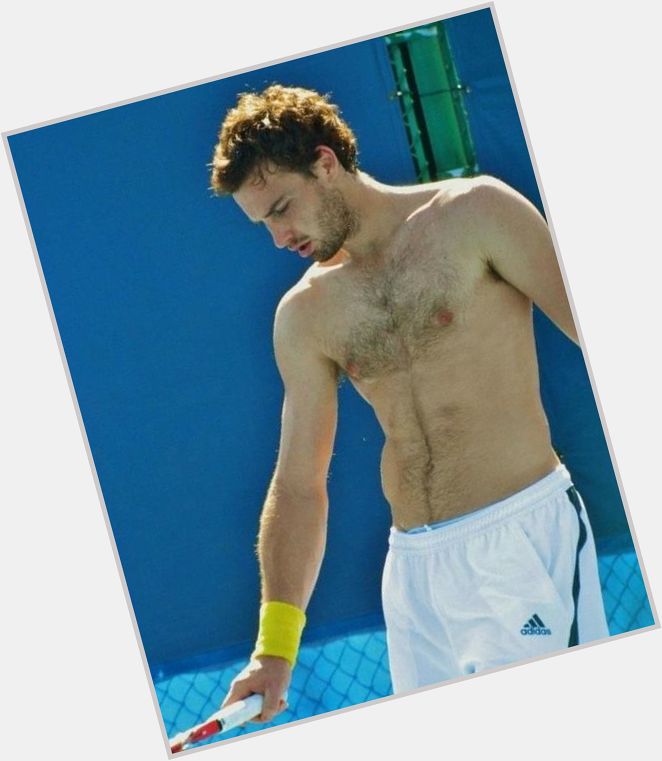 Ernests Gulbis Athletic body,  light brown hair & hairstyles