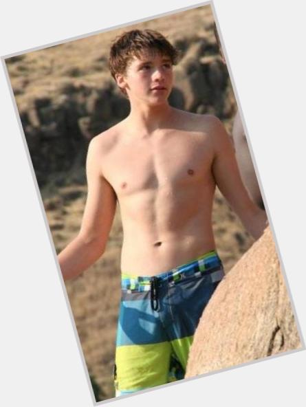Joel Courtney Athletic body,  light brown hair & hairstyles