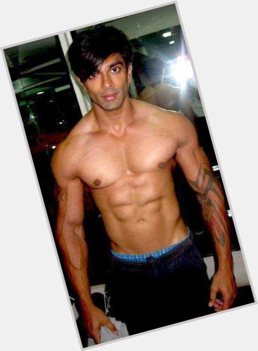 Karan Singh Grover Average body,  black hair & hairstyles