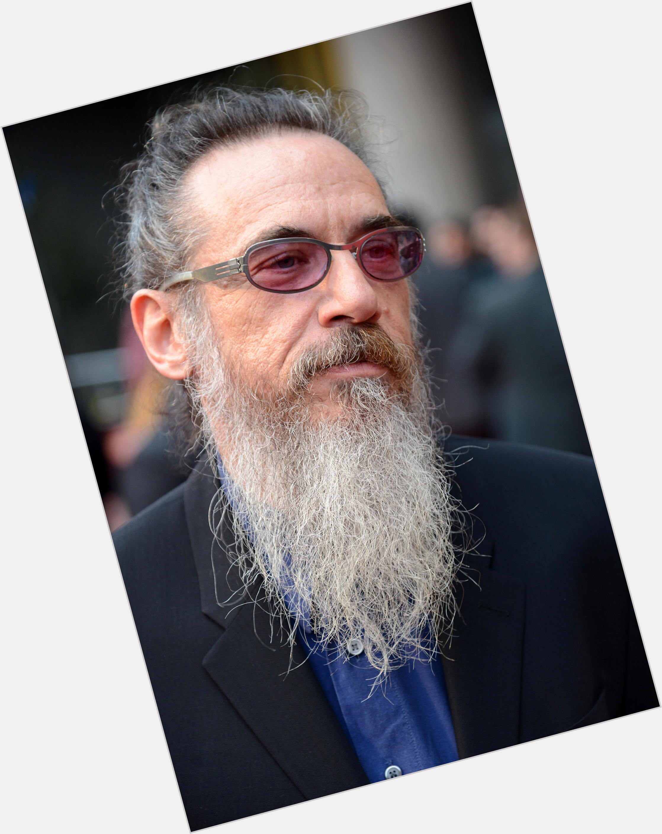 Larry Charles Average body,  salt and pepper hair & hairstyles