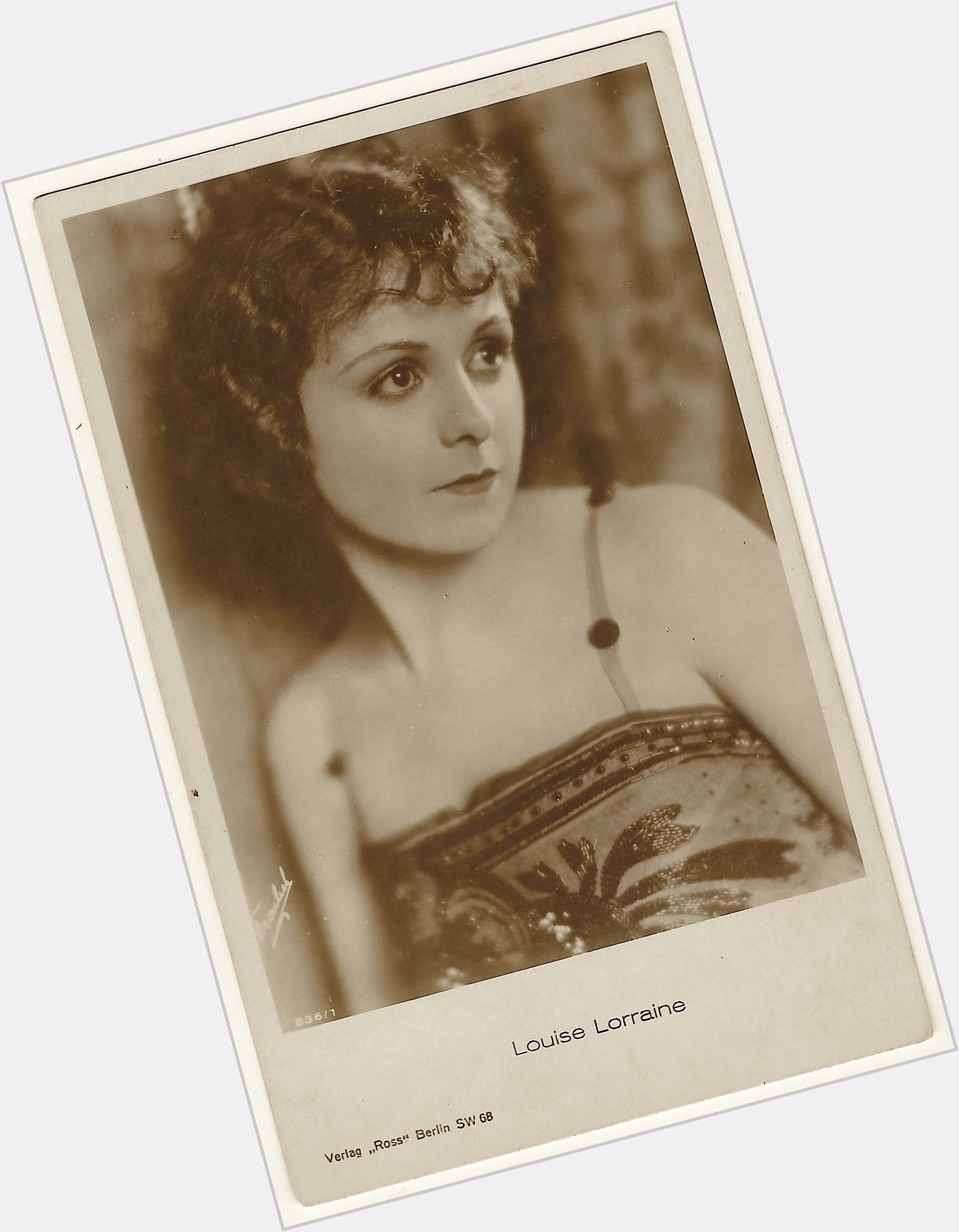 Louise Lorraine Slim body,  dark brown hair & hairstyles
