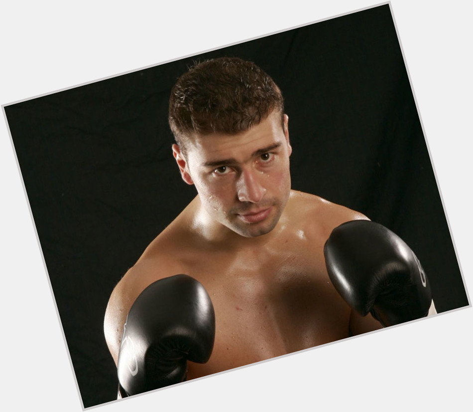 Lucian Bute Athletic body,  light brown hair & hairstyles
