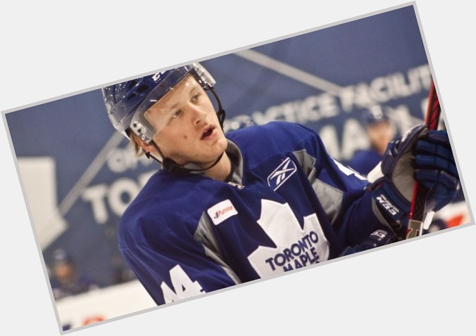 Morgan Rielly Athletic body,  light brown hair & hairstyles