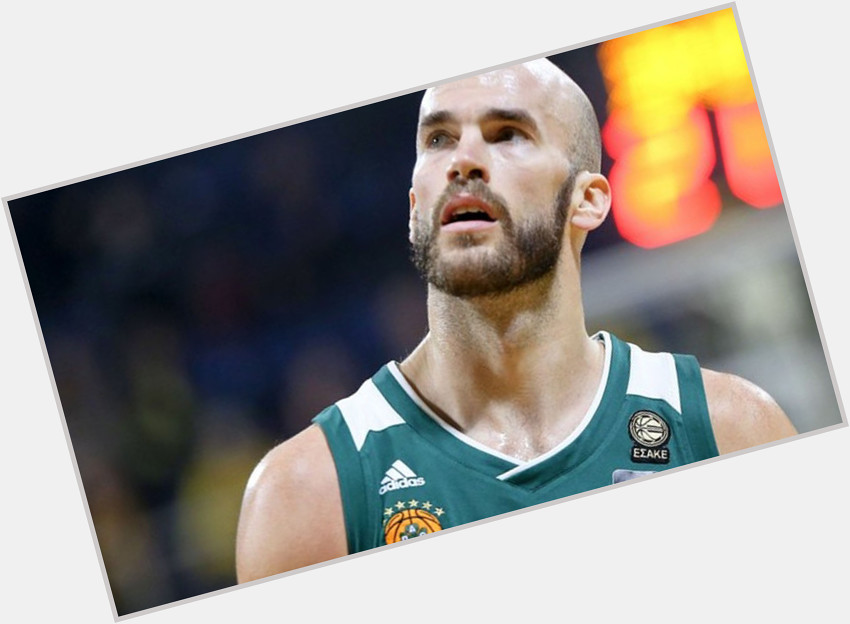 Nick Calathes Athletic body,  bald hair & hairstyles