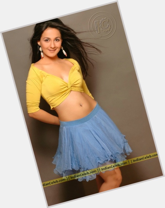 Pooja Ruparel Slim body,  dark brown hair & hairstyles
