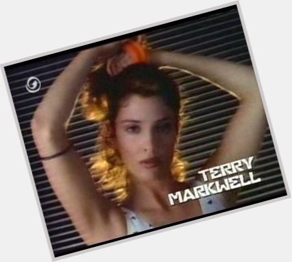 Terry Markwell Slim body,  dark brown hair & hairstyles
